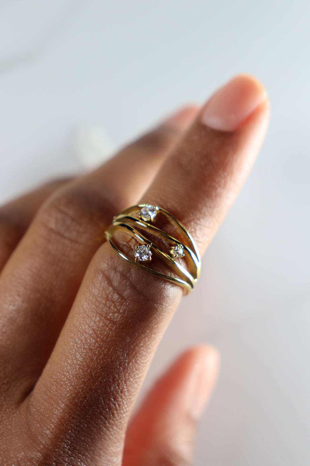 Gold plated statement ring, lightweight and comfortable costume jewelry for women, affordable fashion accessory perfect for bold, on-trend looks.