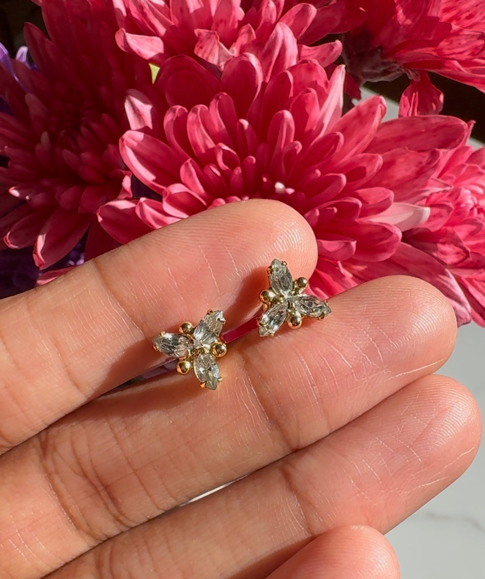 Cubic zirconia stud earrings for women, classic and affordable gold plated fashion jewelry with a diamond-like sparkle, perfect for everyday wear or special occasions.