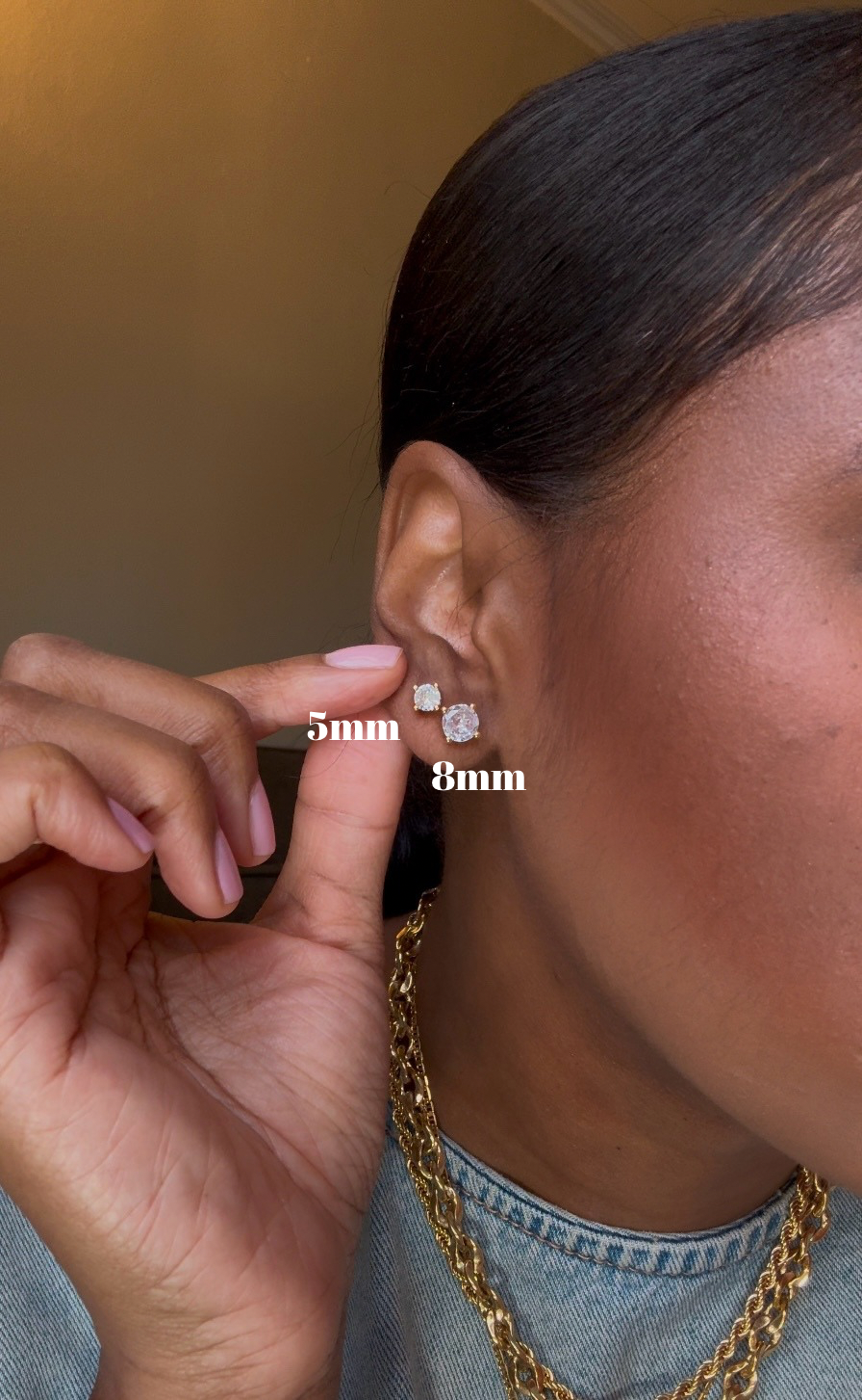 Cubic zirconia stud earrings for women, classic and affordable gold plated fashion jewelry with a diamond-like sparkle, perfect for everyday wear or special occasions.
