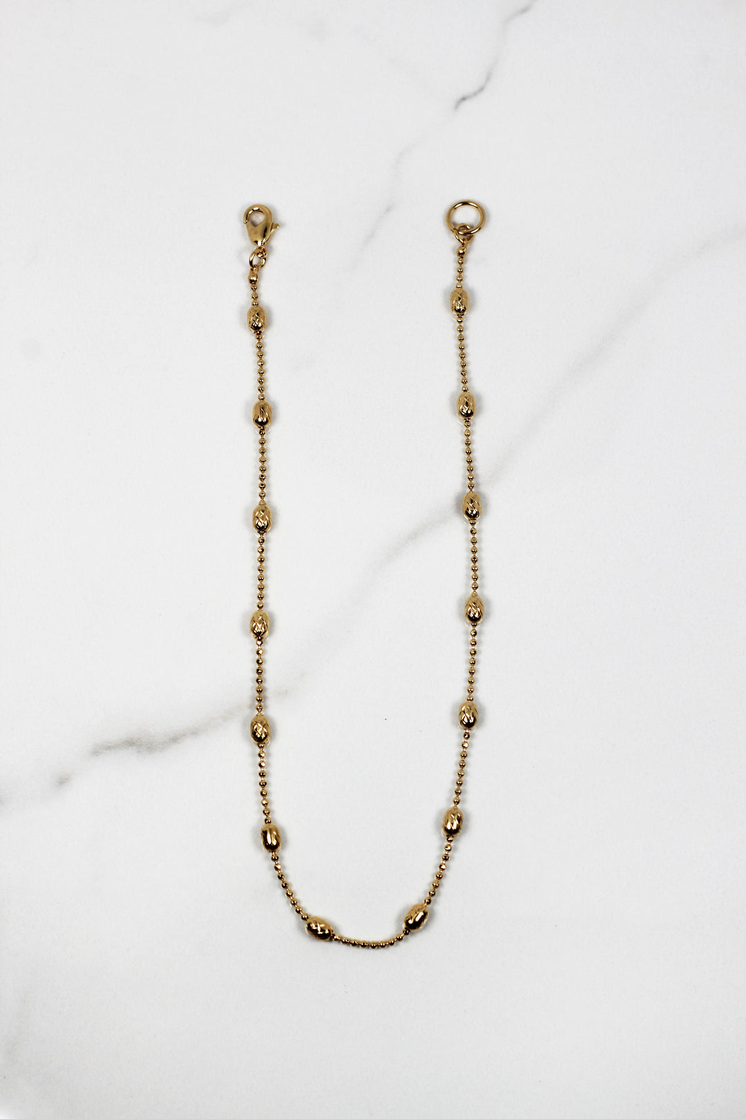 Dainty gold plated bracelet for women, budget-friendly costume jewelry piece that’s tarnish resistant, delicate yet durable for daily wear and stacking.