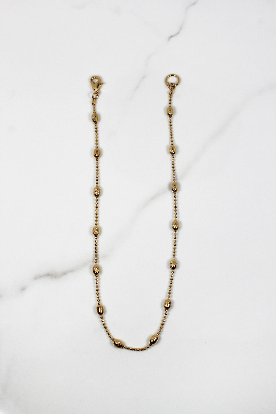 Dainty gold plated bracelet for women, budget-friendly costume jewelry piece that’s tarnish resistant, delicate yet durable for daily wear and stacking.