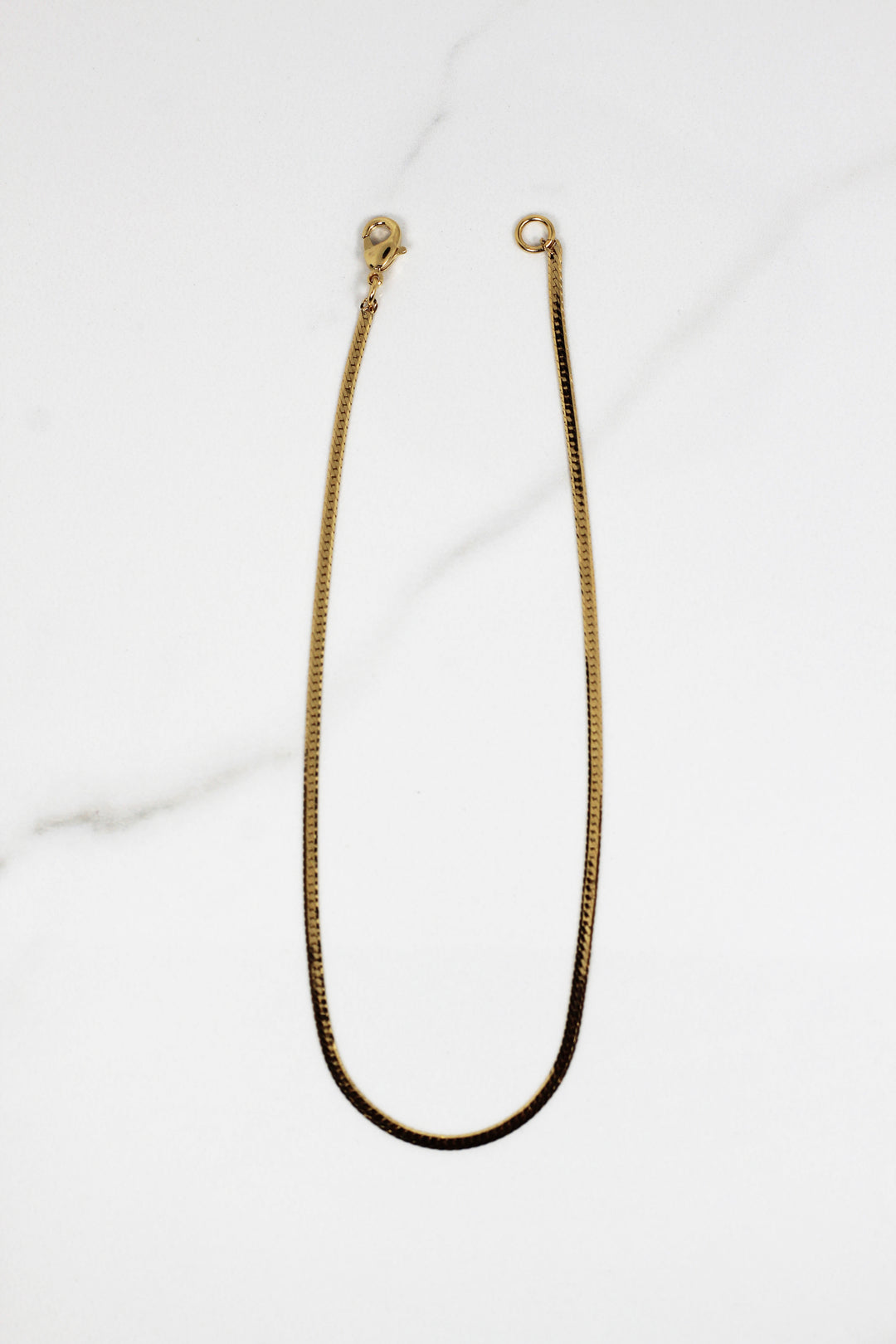 Dainty gold plated bracelet for women, budget-friendly costume jewelry piece that’s tarnish resistant, delicate yet durable for daily wear and stacking.
