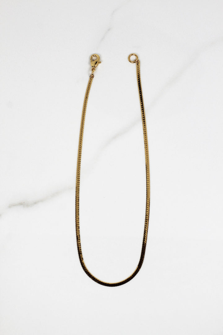 Dainty gold plated bracelet for women, budget-friendly costume jewelry piece that’s tarnish resistant, delicate yet durable for daily wear and stacking.