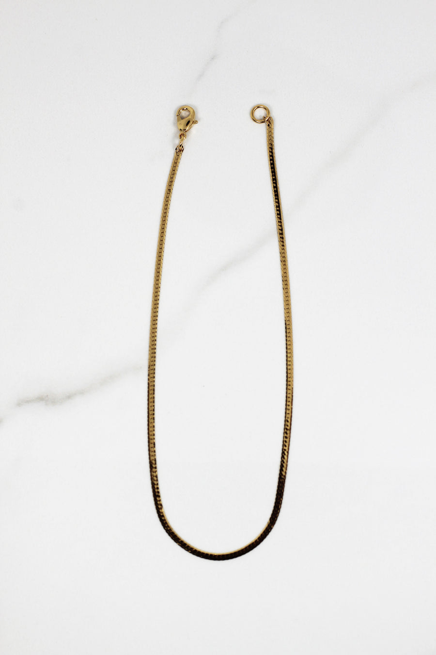 Dainty gold plated bracelet for women, budget-friendly costume jewelry piece that’s tarnish resistant, delicate yet durable for daily wear and stacking.