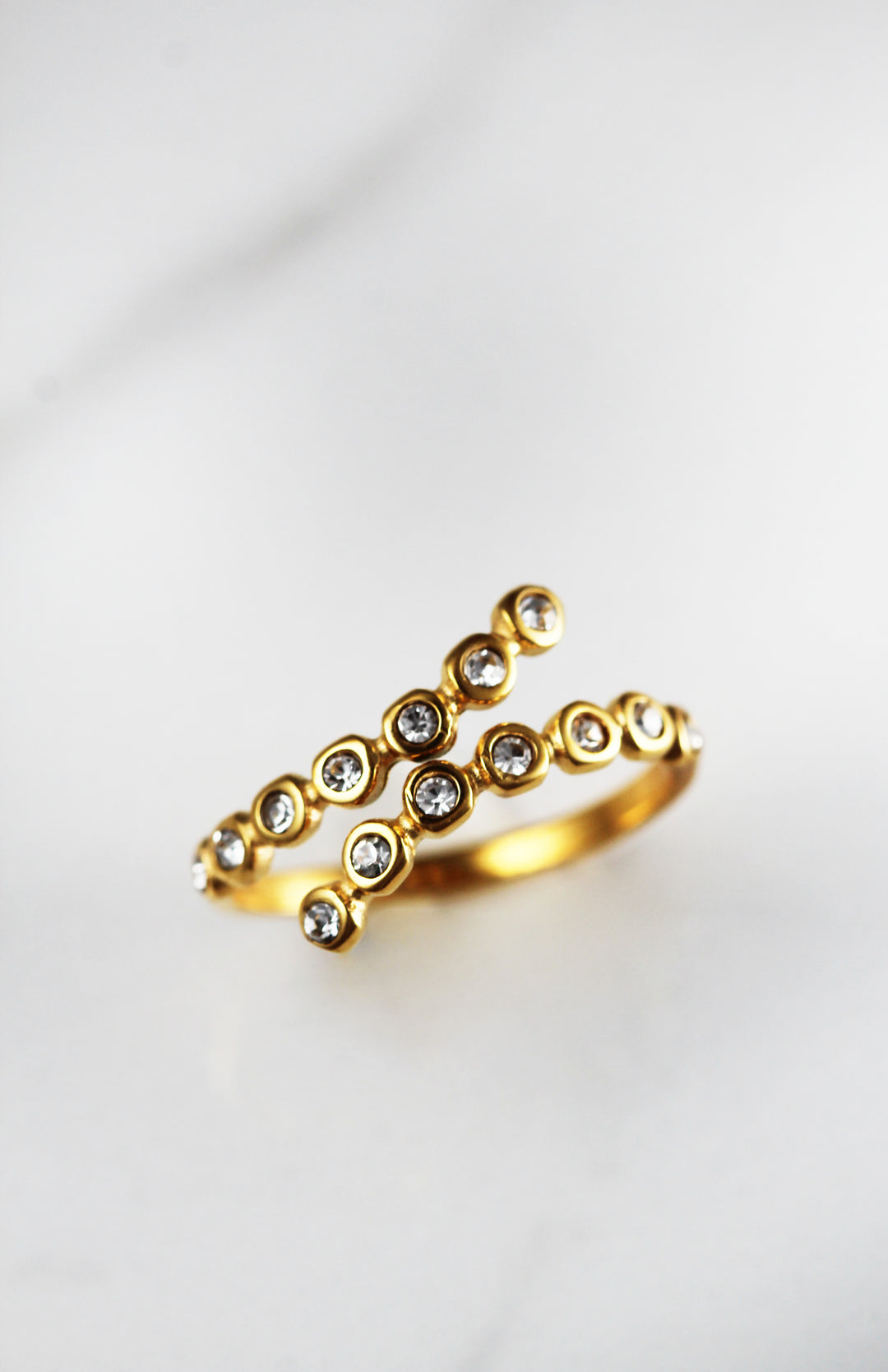 Gold plated statement ring, lightweight and comfortable costume jewelry for women, affordable fashion accessory perfect for bold, on-trend looks.