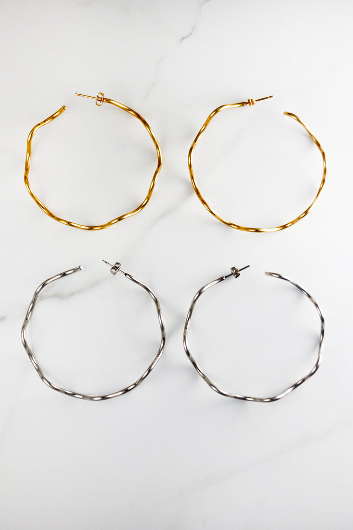 Affordable gold plated hoop earrings for women, lightweight and tarnish resistant costume jewelry, perfect for everyday wear or stacking with trendy gold accessories.