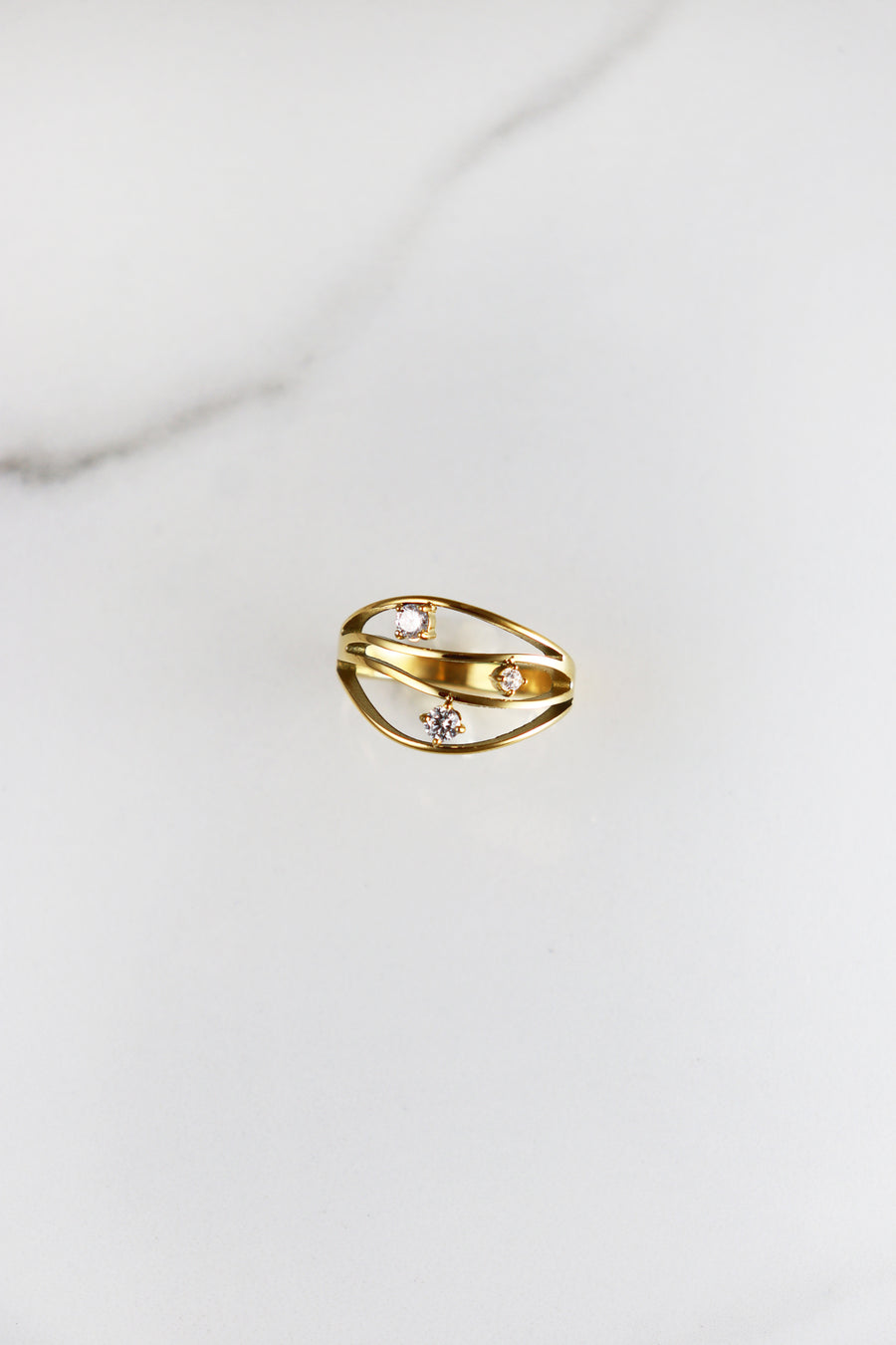 Gold plated statement ring, lightweight and comfortable costume jewelry for women, affordable fashion accessory perfect for bold, on-trend looks.
