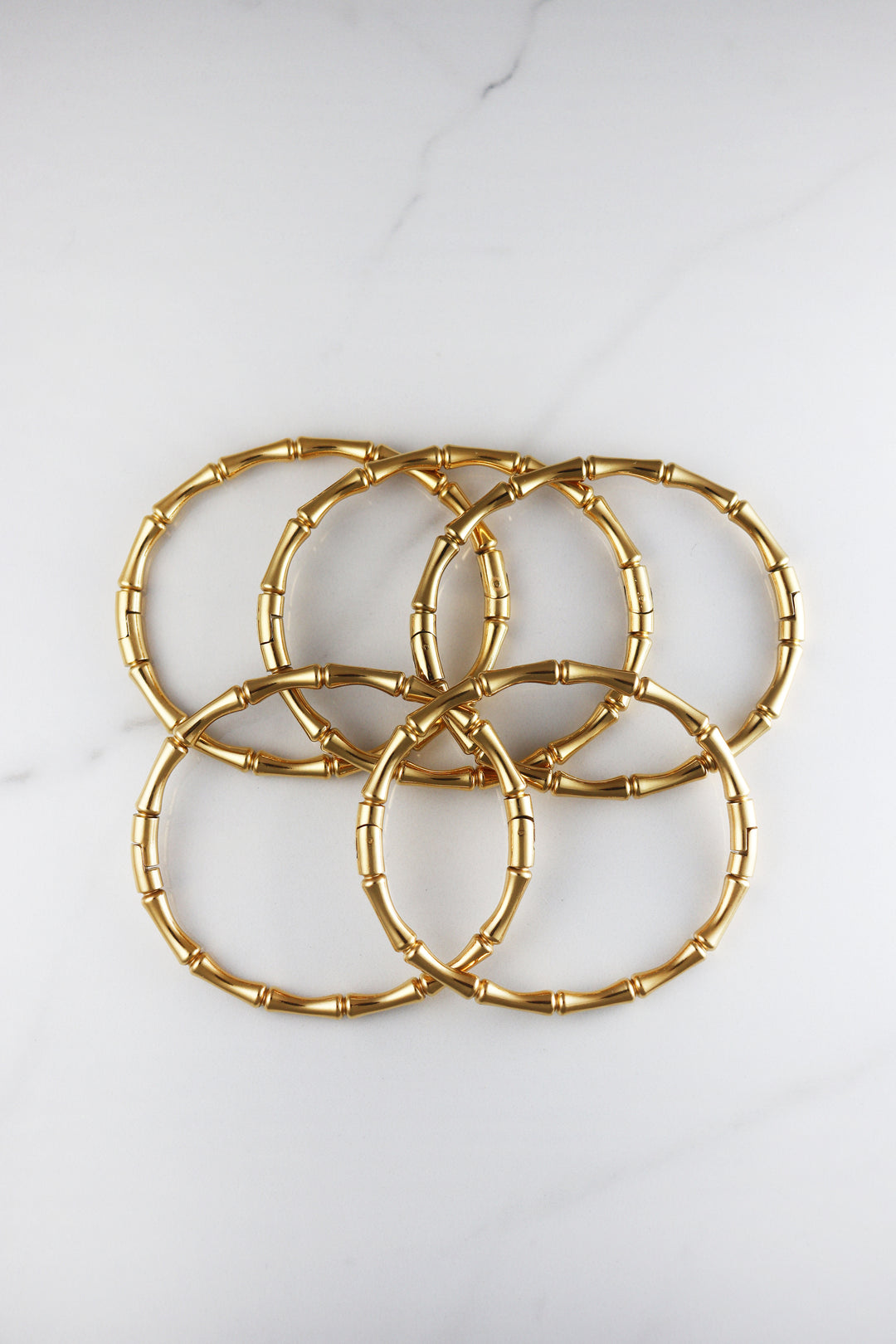 Dainty gold plated bracelet for women, budget-friendly costume jewelry piece that’s tarnish resistant, delicate yet durable for daily wear and stacking.
