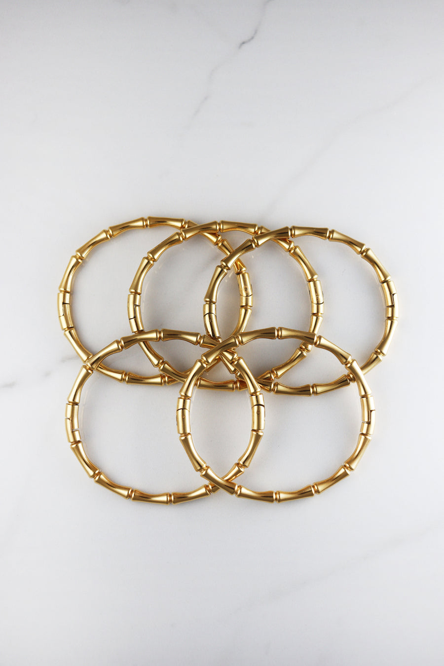 Dainty gold plated bracelet for women, budget-friendly costume jewelry piece that’s tarnish resistant, delicate yet durable for daily wear and stacking.