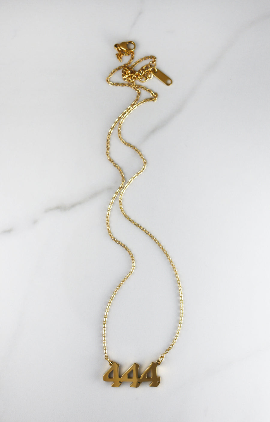 Tarnish free gold plated angel number necklace, meaningful and affordable fashion jewelry for women, perfect for layering or everyday wear.