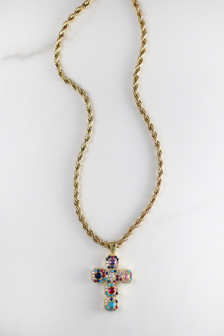 Gold plated cross necklace with CZ stones, available in two options—colorful cubic zirconia or classic diamond-like stones, stylish and affordable costume jewelry for women.