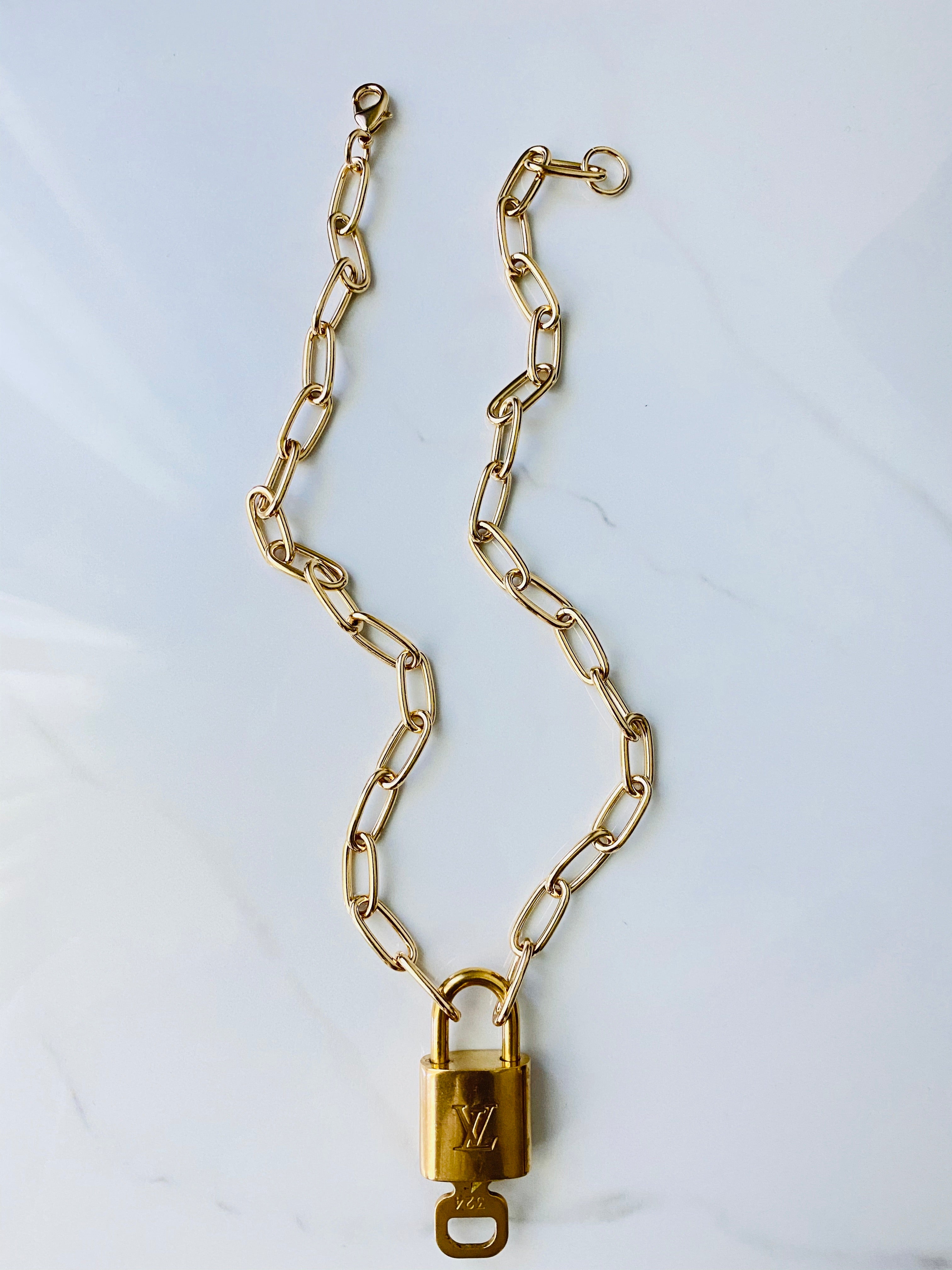 Reworked Vintage Chunky Louis Vuitton Padlock Necklace – Lux Jewelry  Boutique