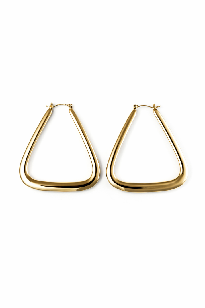 Gold triangle hoop earrings on a white background