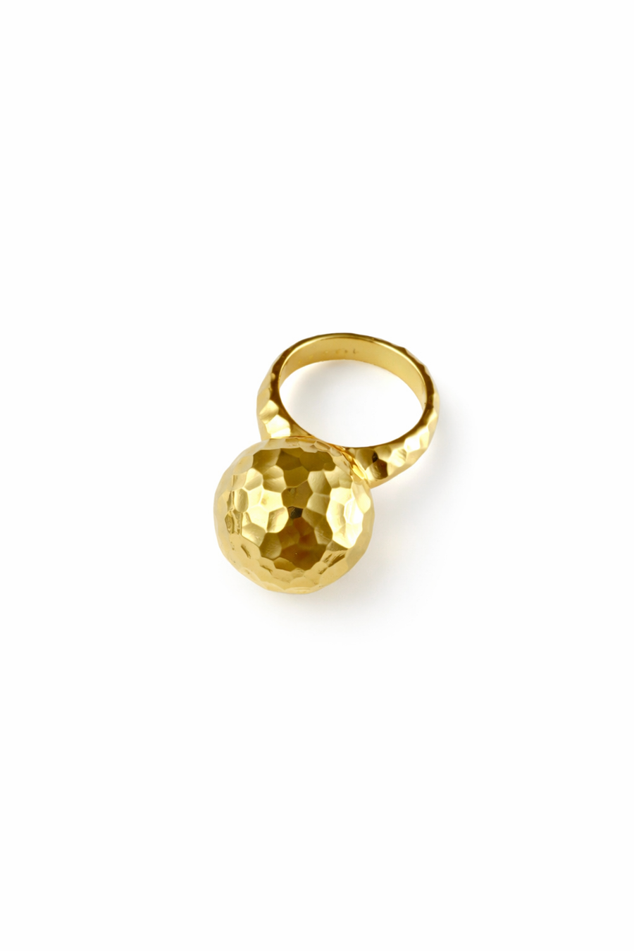 Gold ring with a textured ball on a white background