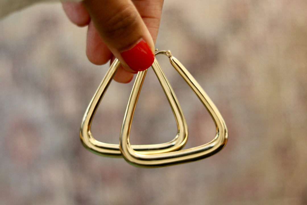Affordable gold plated hoop earrings for women, lightweight and tarnish resistant costume jewelry, perfect for everyday wear or stacking with trendy gold accessories.

