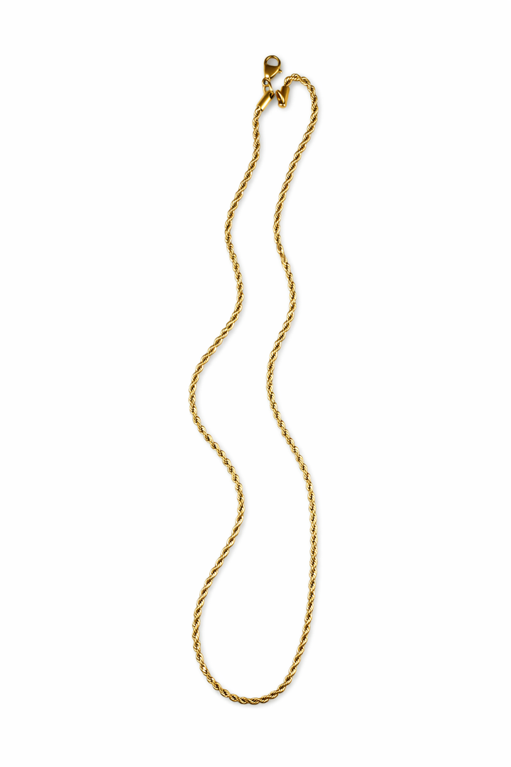 Gold rope necklace on a white background