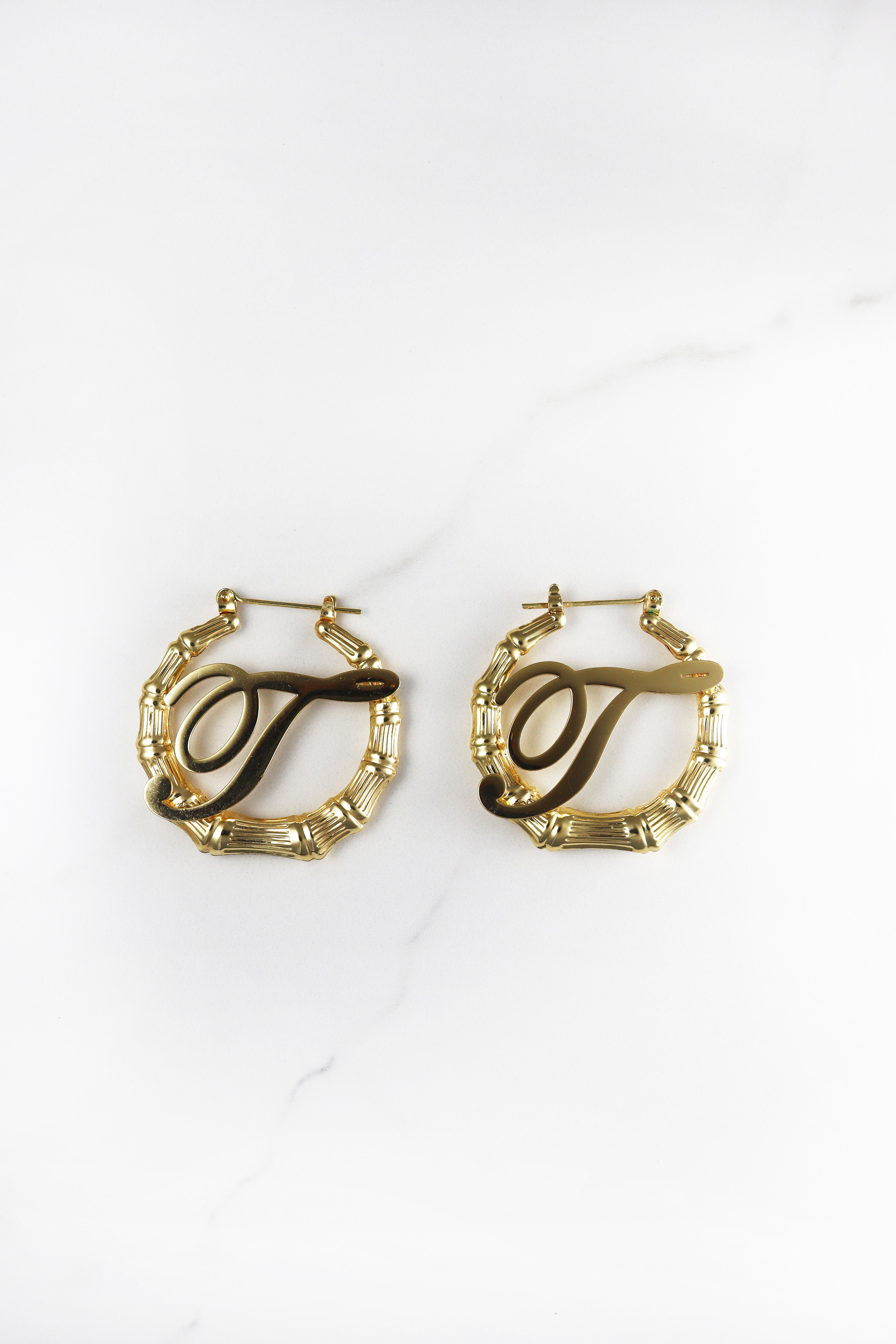 ピアス JIL SANDER  Bamboo hoop earrings Jil Sander Bamboo Hoop Earrings In Gold | ModeSens
