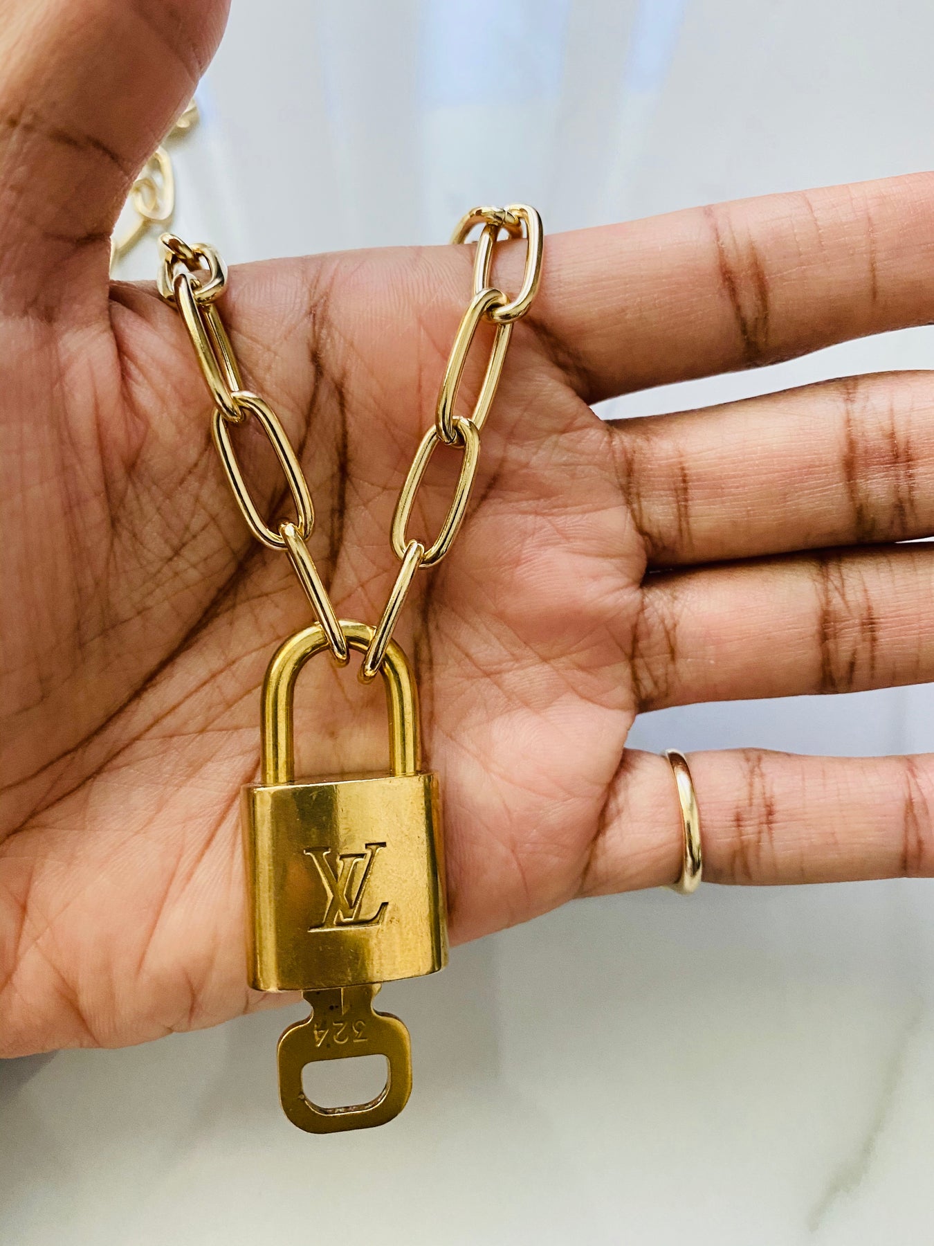 Authentic Louis Vuitton LV Lock Pendant